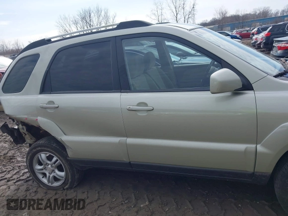 2005 Kia Sportage LX with VIN KNDJF723457135158, listed as a IAAI auction lot 41700735 with 88,200 mi miles and . Bid and sale history available at carsss.com. Image 13.