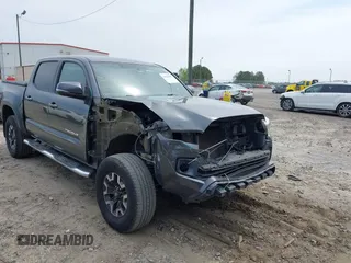 2017 Toyota Tacoma SR5 with VIN 3TMAZ5CN7HM026618, listed as a IAAI auction lot 42033682 with 96,430 mi miles and . Bid and sale history available at carsss.com. Image 6.