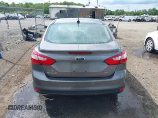2013 Ford Focus SE z VIN 1FADP3F24DL104718, wystawiony jako IAAI lot #42206680 z przebiegiem Nie podano mil oraz . Historia ofert i sprzedaży dostępna na DreamBid. Obrazek 16.