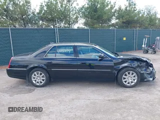 2009 Cadillac DTS 1SC z VIN 1G6KD57Y29U141800, wystawiony jako IAAI lot #42190874 z przebiegiem 115 043 mil mil oraz . Historia ofert i sprzedaży dostępna na DreamBid. Obrazek 13.