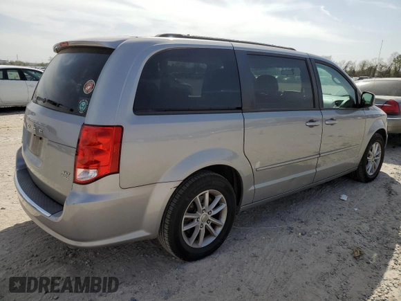 2014 Dodge Grand Caravan SXT with VIN 2C4RDGCG2ER273533, listed as a Copart auction lot 49228495 with 124,070 mi miles and Salvage Title. Bid and sale history available at DreamBid. Image 3.
