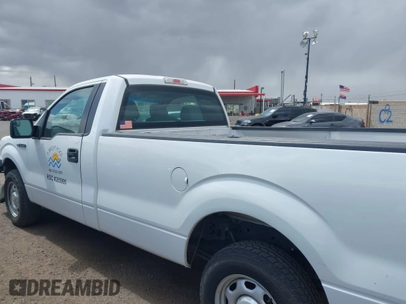 2014 Ford F-150 XL with VIN 1FTMF1CM4EKE98669, listed as a IAAI auction lot 41927986 with 133,246 mi miles and . Bid and sale history available at DreamBid. Image 14.