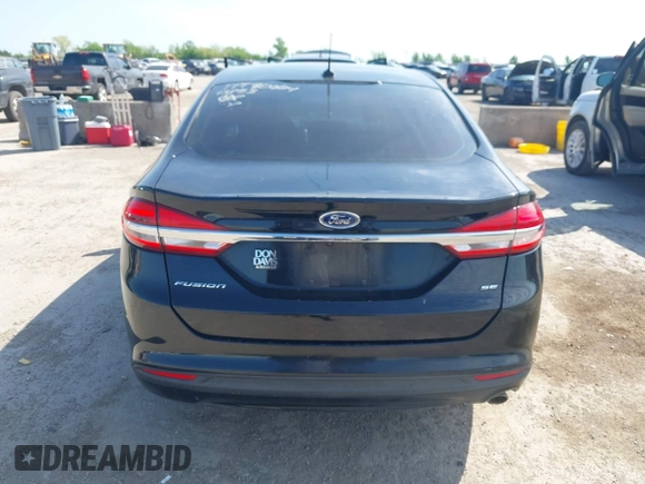 2018 Ford Fusion SE z VIN 3FA6P0H74JR125761, wystawiony jako IAAI lot #41992708 z przebiegiem 102 242 mil mil oraz . Historia ofert i sprzedaży dostępna na DreamBid. Obrazek 16.