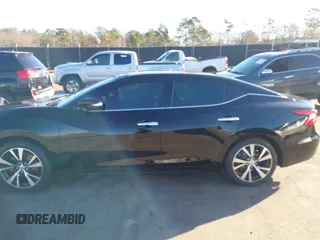 2016 Nissan Maxima SV with VIN 1N4AA6AP0GC385090, listed as a IAAI auction lot 41215857 with 97,072 mi miles and . Bid and sale history available at DreamBid. Image 14.