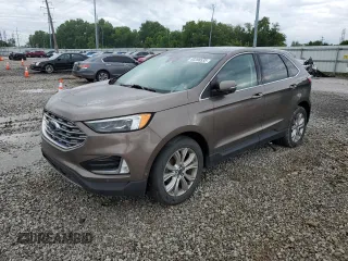 2019 Ford Edge Titanium z VIN 2FMPK3K92KBB81704, wystawiony jako Copart lot #60288535 z przebiegiem 143 937 mil mil oraz Czysty tytuł • Clean title. Historia ofert i sprzedaży dostępna na DreamBid. Obrazek 1.