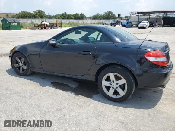 2007 Mercedes-Benz SLK-Class 3.0L with VIN WDBWK54F57F157433, listed as a Copart auction lot 66233794 with 104,198 mi miles and Salvage Title. Bid and sale history available at carsss.com. Image 2.