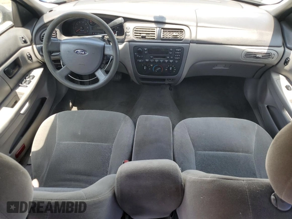 2006 Ford Taurus SE with VIN 1FAFP53U96A104173, listed as a Copart auction lot 59624865 with 145,005 mi miles and Salvage title. Bid and sale history available at DreamBid. Image 8.
