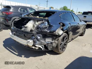 2021 BMW 8 Series M850i with VIN WBAGV8C00MCF55108, listed as a Copart auction lot 56305084 with 27,399 mi miles and Salvage Title. Bid and sale history available at carsss.com. Image 3.