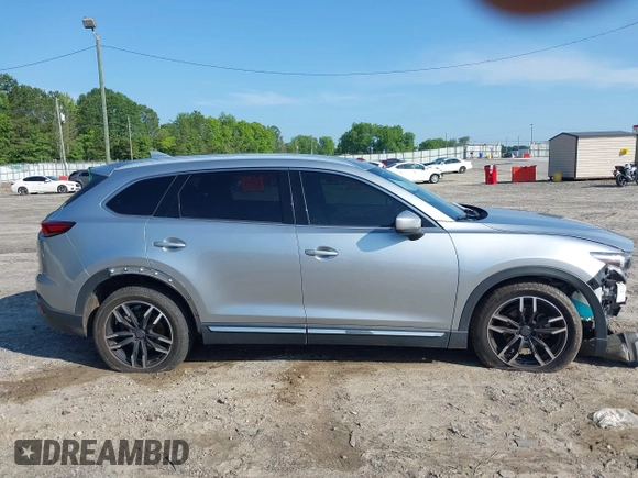 2016 Mazda CX-9 Signature with VIN JM3TCBEY7G0120023, listed as a IAAI auction lot 42431039 with 160,276 mi miles and . Bid and sale history available at DreamBid. Image 13.