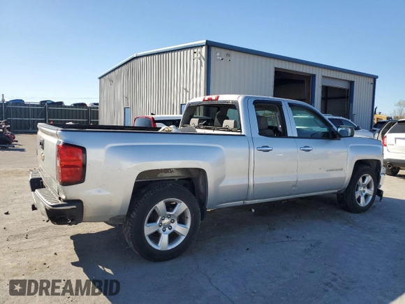 2015 Chevrolet Silverado 1500 LS with VIN 1GCRCPEH1FZ335827, listed as a Copart auction lot 50414585 with 214,079 mi miles and Salvage Title. Bid and sale history available at DreamBid. Image 3.