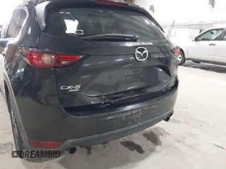 2017 Mazda CX-5 Grand Touring with VIN JM3KFBDL6H0143013, listed as a IAAI auction lot 41912979 with 122,890 mi miles. Bid and sale history available at carsss.com. Image 19.