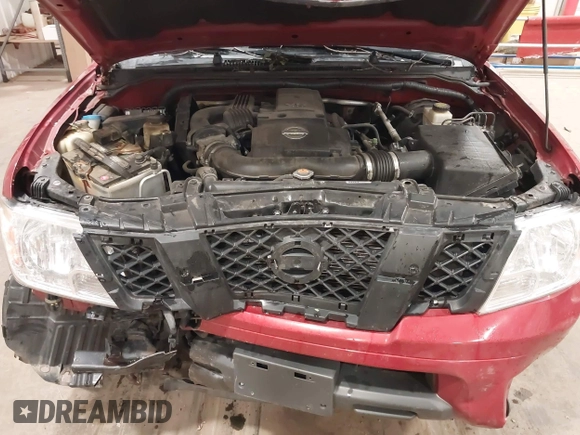 2014 Nissan Frontier S with VIN 1N6AD0EV6EN708600, listed as a IAAI auction lot 42296112 with 112,737 mi miles and . Bid and sale history available at DreamBid. Image 10.