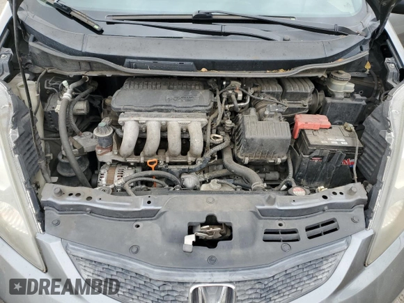 2013 Honda Fit with VIN JHMGE8H3XDC042658, listed as a Copart auction lot 89088035 with 129,132 mi miles and Salvage Title. Bid and sale history available at carsss.com. Image 12.