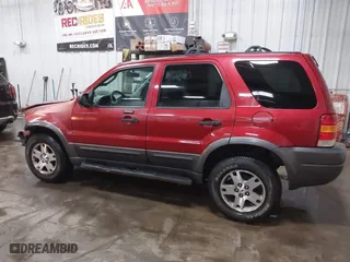 2003 Ford Escape XLT Popular 2 with VIN 1FMCU93173KA52806, listed as a IAAI auction lot 41696250 with 138,338 mi miles. Bid and sale history available at carsss.com. Image 14.