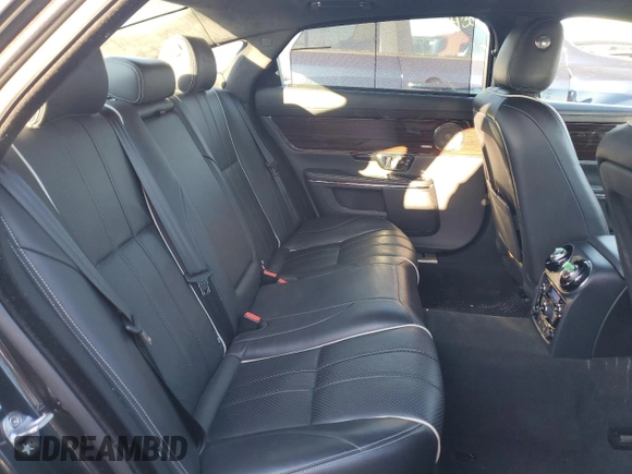 2015 Jaguar XJ Portfolio z VIN SAJWJ2GD9F8V85717, wystawiony jako Copart lot #82539734 z przebiegiem 113 721 mil mil oraz Szkoda całkowita • Salvage title. Historia ofert i sprzedaży dostępna na DreamBid. Obrazek 10.