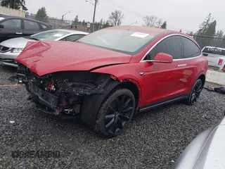 2019 Tesla Model X 75D with VIN 5YJXCBE23KF207739, listed as a IAAI auction lot 41808567 with 191,233 mi miles and . Bid and sale history available at DreamBid. Image 2.
