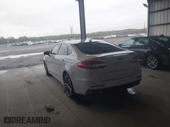 2019 Ford Fusion Titanium with VIN 3FA6P0K95KR271291, listed as a IAAI auction lot 41983320 with 71,962 mi miles and . Bid and sale history available at DreamBid. Image 3.