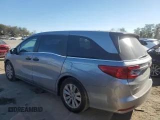2018 Honda Odyssey LX with VIN 5FNRL6H22JB087152, listed as a Copart auction lot 76754974 with 73,057 mi miles and Salvage Title. Bid and sale history available at carsss.com. Image 2.
