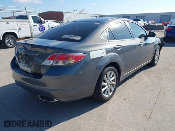 2011 Mazda 6 i Grand Touring with VIN 1YVHZ8CHXB5M27937, listed as a IAAI auction lot 42574587 with 203,952 mi miles and . Bid and sale history available at DreamBid. Image 4.