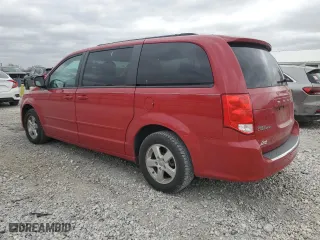 2012 Dodge Grand Caravan SXT with VIN 2C4RDGCGXCR172186, listed as a Copart auction lot 49641015 with 69,726 mi miles and Salvage Title. Bid and sale history available at carsss.com. Image 2.