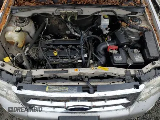 2009 Ford Escape XLS with VIN 1FMCU02779KB55136, listed as a Copart auction lot 81513864 with 108,906 mi miles and Salvage title. Bid and sale history available at DreamBid. Image 12.