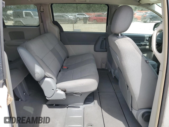 2008 Chrysler Town & Country LX z VIN 2A8HR44HX8R708086, wystawiony jako Copart lot #56577115 z przebiegiem 159 482 mil mil oraz Szkoda całkowita • Salvage title. Historia ofert i sprzedaży dostępna na DreamBid. Obrazek 11.