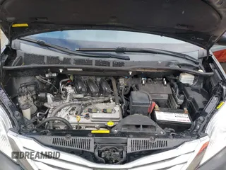2011 Toyota Sienna XLE AAS with VIN 5TDYK3DC5BS141021, listed as a IAAI auction lot 41538641 with 127,805 mi miles and . Bid and sale history available at DreamBid. Image 10.