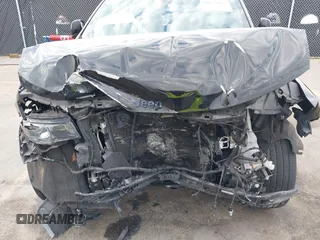 2019 Jeep Grand Cherokee Laredo E with VIN 1C4RJEAGXKC571770, listed as a IAAI auction lot 41677487 with 113,089 mi miles. Bid and sale history available at carsss.com. Image 6.