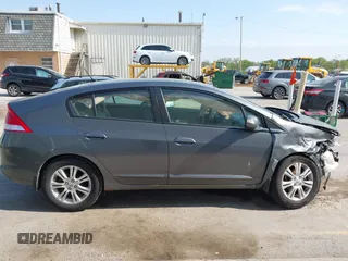 2011 Honda Insight EX z VIN JHMZE2H7XBS006254, wystawiony jako IAAI lot #42222213 z przebiegiem 244 078 mil mil oraz . Historia ofert i sprzedaży dostępna na DreamBid. Obrazek 13.