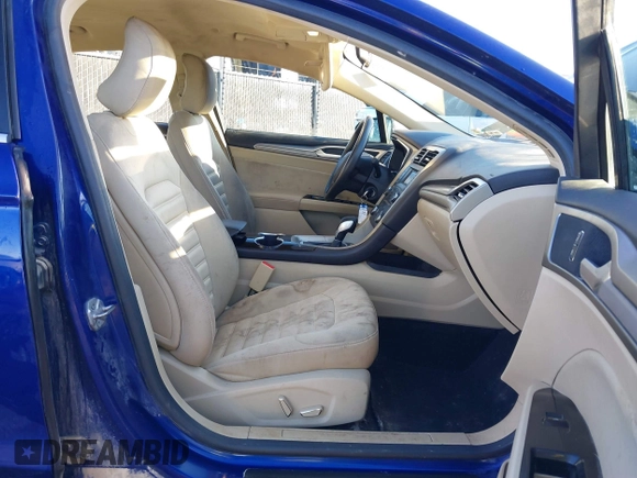 2016 Ford Fusion SE Hybrid with VIN 3FA6P0LU0GR388187, listed as a IAAI auction lot 38604646 with 135,625 mi miles. Bid and sale history available at carsss.com. Image 5.