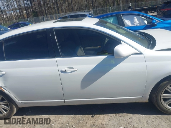 2007 Toyota Avalon XL with VIN 4T1BK36B17U196283, listed as a IAAI auction lot 41569087 with 370,304 mi miles. Bid and sale history available at carsss.com. Image 13.