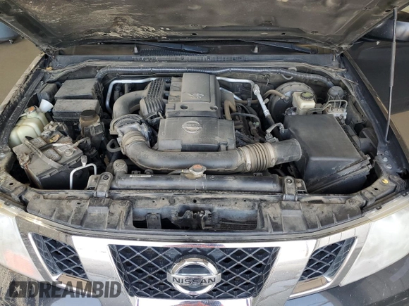 2014 Nissan Frontier SV with VIN 1N6AD0EV9EN710020, listed as a Copart auction lot 60895575 with 125,090 mi miles and Salvage title. Bid and sale history available at DreamBid. Image 11.