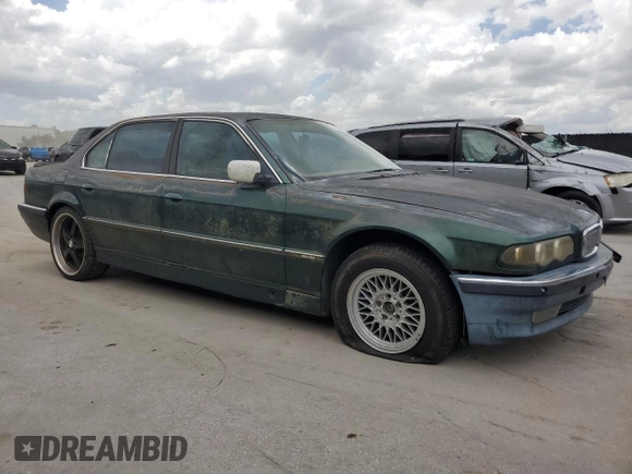 1996 BMW 7 Series 740iL z VIN WBAGJ8326TDL35670, wystawiony jako Copart lot #60806225 z przebiegiem 123 458 mil mil oraz Czysty tytuł • Clean title. Historia ofert i sprzedaży dostępna na DreamBid. Obrazek 4.