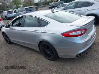 2014 Ford Fusion Titanium with VIN 3FA6P0K95ER151625, listed as a IAAI auction lot 42109141 with 182,328 mi miles and . Bid and sale history available at DreamBid. Image 3.