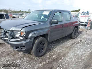 2013 Honda Ridgeline RT with VIN 5FPYK1F28DB011743, listed as a IAAI auction lot 41435328 with 71,136 mi miles. Bid and sale history available at carsss.com. Image 2.