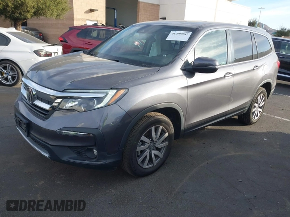 2021 Honda Pilot EX-L with VIN 5FNYF5H54MB018846, listed as a IAAI auction lot 41208987 with 80,757 mi miles and . Bid and sale history available at DreamBid. Image 18.