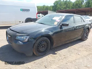 2015 Chrysler 300 with VIN 2C3CCABG1FH807740, listed as a IAAI auction lot 40246268 with 174,037 mi miles. Bid and sale history available at carsss.com. Image 2.
