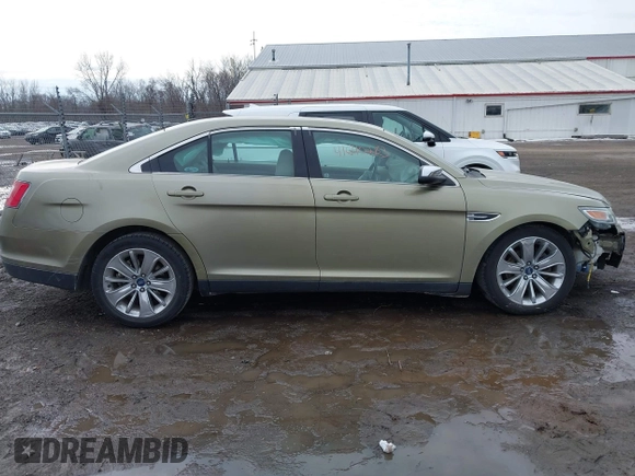 2012 Ford Taurus Limited z VIN 1FAHP2FW7CG128260, wystawiony jako IAAI lot #41640283 z przebiegiem 140 192 mil mil oraz . Historia ofert i sprzedaży dostępna na DreamBid. Obrazek 14.