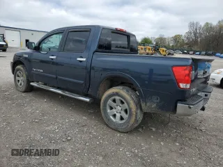 2015 Nissan Titan SV with VIN 1N6AA0EC9FN500624, listed as a Copart auction lot 50982985 with 128,976 mi miles and Salvage title. Bid and sale history available at DreamBid. Image 2.