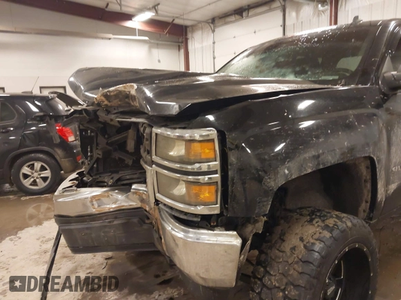 2014 Chevrolet Silverado 1500 LT with VIN 3GCUKRECXEG503427, listed as a IAAI auction lot 41526582 with 130,070 mi miles and . Bid and sale history available at DreamBid. Image 6.