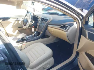 2015 Ford Fusion SE Hybrid with VIN 3FA6P0LUXFR165766, listed as a IAAI auction lot 41409353 with 32,388 mi miles. Bid and sale history available at carsss.com. Image 5.