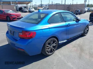 2015 BMW 2 Series M235i with VIN WBA1J7C59FV254140, listed as a IAAI auction lot 41642427 with 23,957 mi miles and . Bid and sale history available at carsss.com. Image 4.