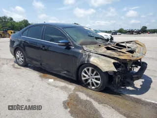 2014 Volkswagen Jetta SE z VIN 3VWD07AJ4EM445862, wystawiony jako Copart lot #61411995 z przebiegiem Nie podano mil oraz Czysty tytuł • Clean title. Historia ofert i sprzedaży dostępna na DreamBid. Obrazek 4.