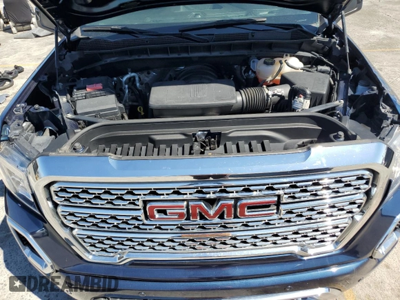 2022 GMC Sierra 1500 Denali with VIN 3GTU9FEDXNG213711, listed as a Copart auction lot 64112245 with 63,476 mi miles and Salvage title. Bid and sale history available at DreamBid. Image 11.