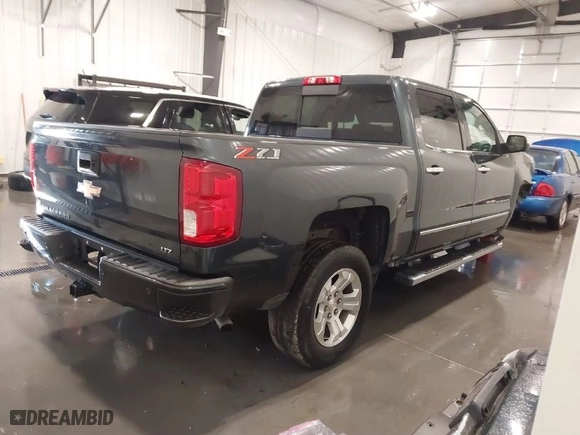 2018 Chevrolet Silverado 1500 LTZ with VIN 3GCUKSEC5JG331941, listed as a IAAI auction lot 41352481 with 68,000 mi miles. Bid and sale history available at carsss.com. Image 4.