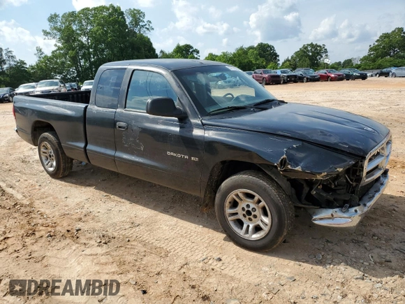 2001 Dodge Dakota z VIN 1B7GL22X81S204868, wystawiony jako Copart lot #57178895 z przebiegiem 298 667 mil mil oraz Szkoda całkowita • Salvage title. Historia ofert i sprzedaży dostępna na DreamBid. Obrazek 4.