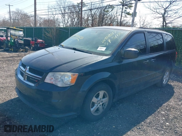 2013 Dodge Grand Caravan SXT with VIN 2C4RDGCG1DR626827, listed as a IAAI auction lot 38984754 with 224,487 mi miles and . Bid and sale history available at DreamBid. Image 2.