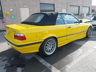 1997 BMW 3-Series 328IC with VIN WBABK8323VET99797, listed as a IAAI auction lot 41616423 with 177,621 mi miles. Bid and sale history available at carsss.com. Image 4.