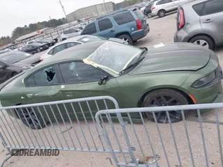 2022 Dodge Charger SXT with VIN 2C3CDXBG8NH162129, listed as a IAAI auction lot 41759139 with 92,061 mi miles and . Bid and sale history available at DreamBid. Image 14.