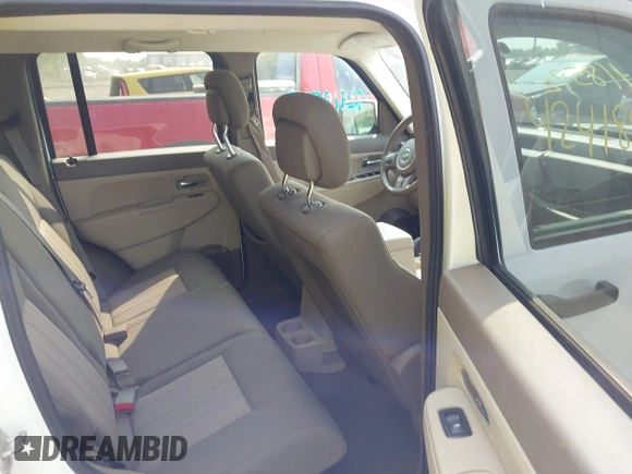 2012 Jeep Liberty Sport with VIN 1C4PJMAK7CW151132, listed as a IAAI auction lot 42418592 with 203,200 mi miles and . Bid and sale history available at DreamBid. Image 8.